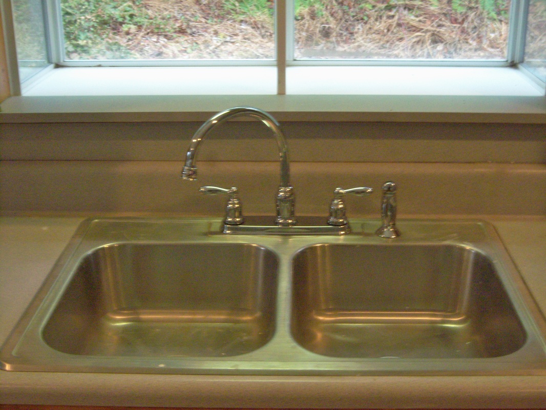 Install new high neck faucet for easy and inexpensive litchen appeal