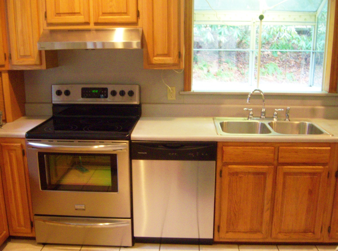 Kitchen renovation on a budget with appliance installation.