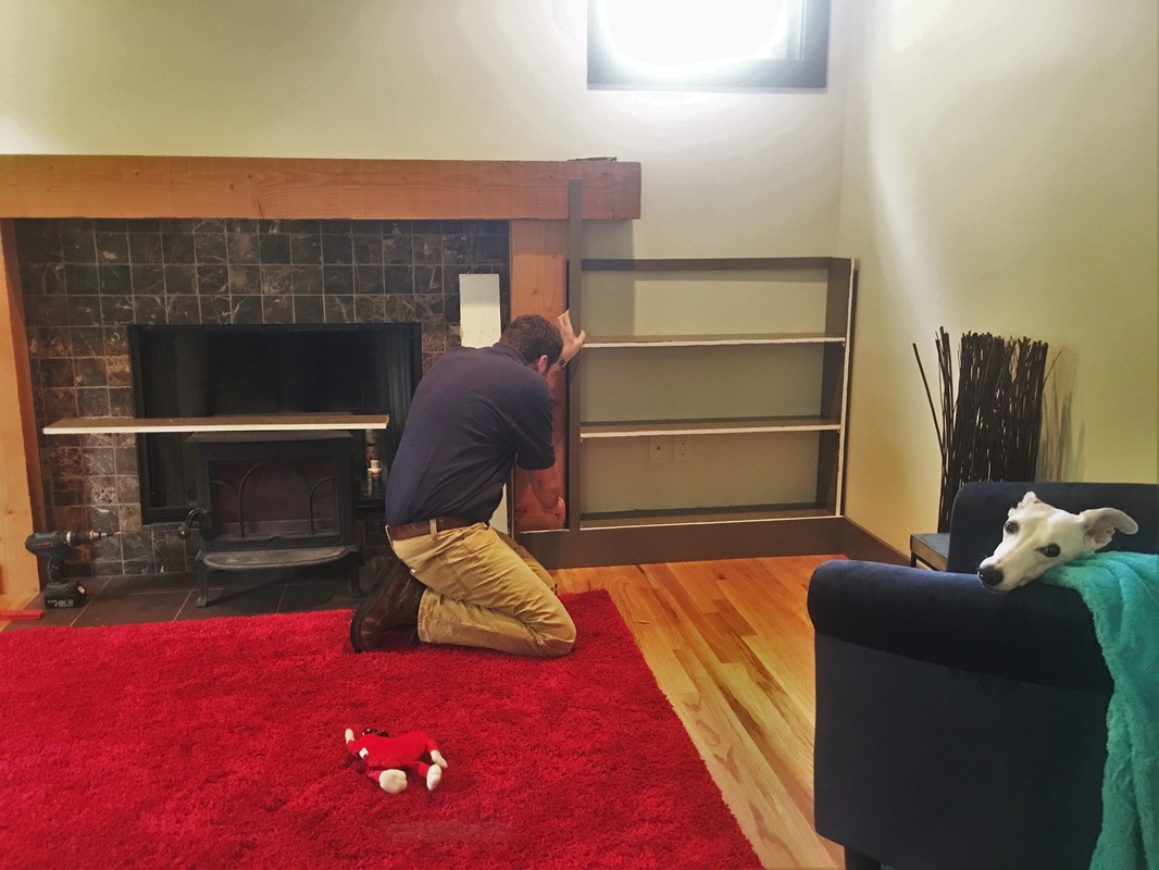 Picture of Arthur installing shelves