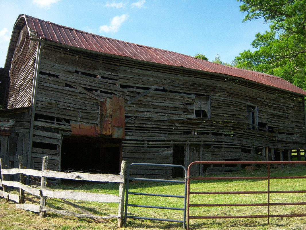 Wavy barn in need of new siding